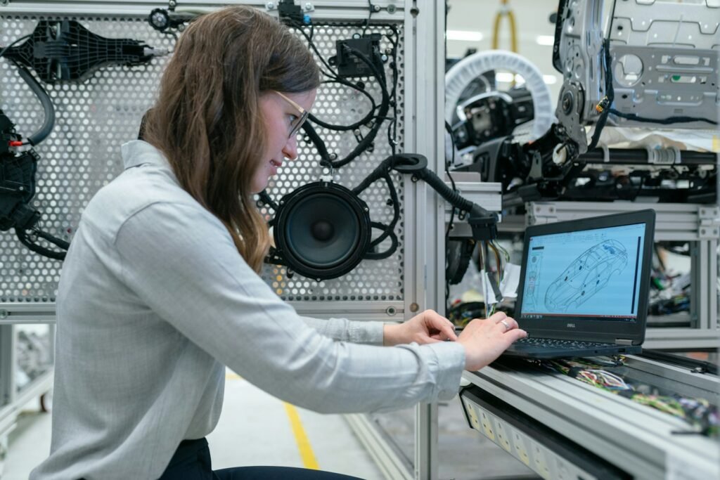 Engineer performing instrumented testing in a technical laboratory